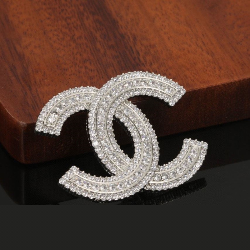 Ch*el brooches